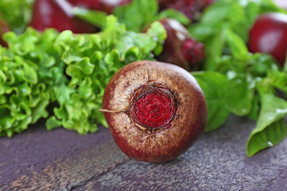 Beets with Leafy Greens on a Table